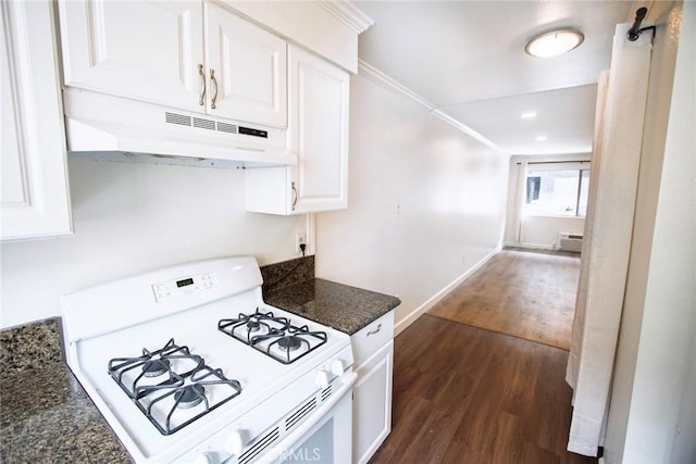 240 W Verdugo Ave Unit K, Burbank, CA 91502 - kitchen with under cabinet range hood, white cabinetry, dark wood-type flooring, and white gas stove