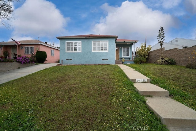 1125 W 129th St, Gardena, CA 90247 - bungalow featuring stucco siding and a front lawn