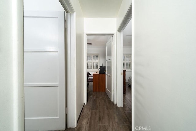 1125 W 129th St, Gardena, CA 90247 - hall with crown molding and dark wood-style flooring