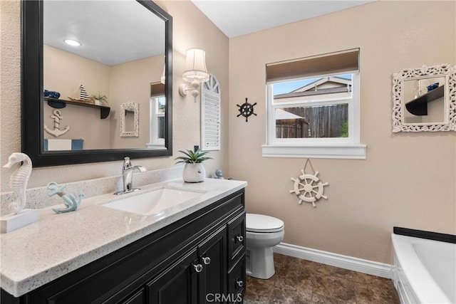 1131 Saint George Dr, San Dimas, CA 91773 - bathroom with baseboards, a tub, toilet, and vanity