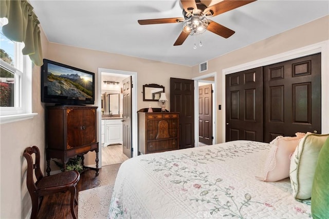 1131 Saint George Dr, San Dimas, CA 91773 - bedroom with visible vents, a closet, wood finished floors, ensuite bathroom, and ceiling fan