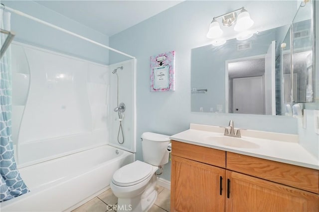 full bath featuring tile patterned flooring, shower / tub combo, vanity, baseboards, and toilet