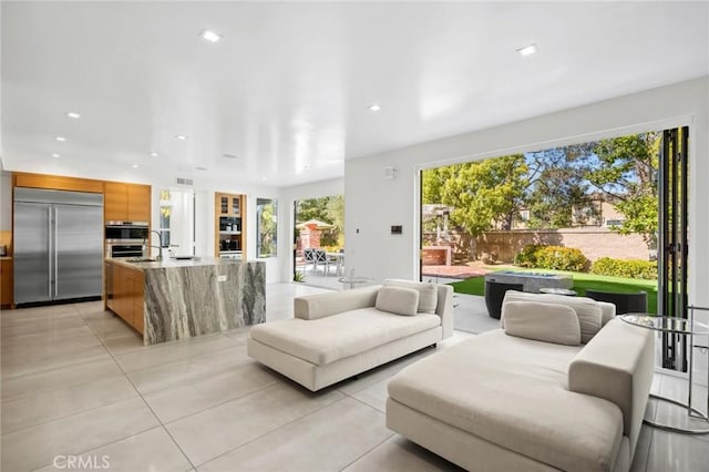 3 Bridgeport Rd, Newport Coast, CA 92657 - living room with recessed lighting and light tile patterned floors