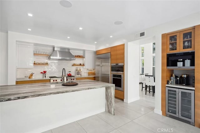 3 Bridgeport Rd, Newport Coast, CA 92657 - kitchen featuring visible vents, open shelves, wine cooler, stainless steel appliances, and wall chimney exhaust hood