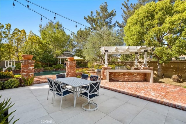 3 Bridgeport Rd, Newport Coast, CA 92657 - view of patio featuring a pergola, exterior kitchen, fence, and outdoor dining area