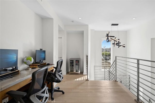 3 Bridgeport Rd, Newport Coast, CA 92657 - office featuring light wood finished floors and a chandelier