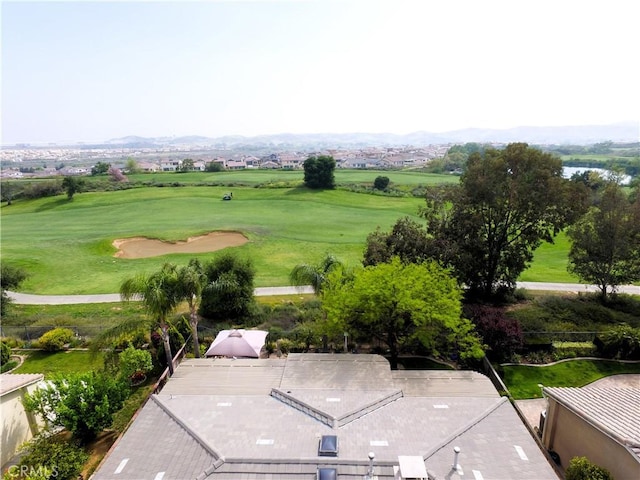 birds eye view of property with golf course view