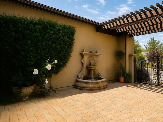 view of patio / terrace featuring a pergola