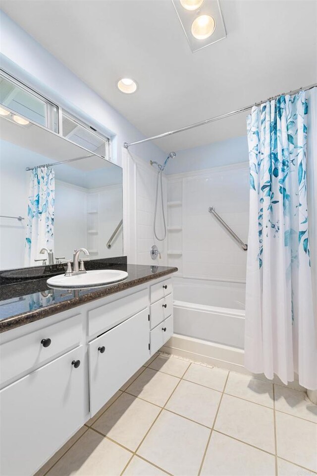 3685 Vista Campana N Unit 61, Oceanside, CA 92057 - bathroom featuring shower / bath combo with shower curtain, vanity, tile patterned floors, and recessed lighting