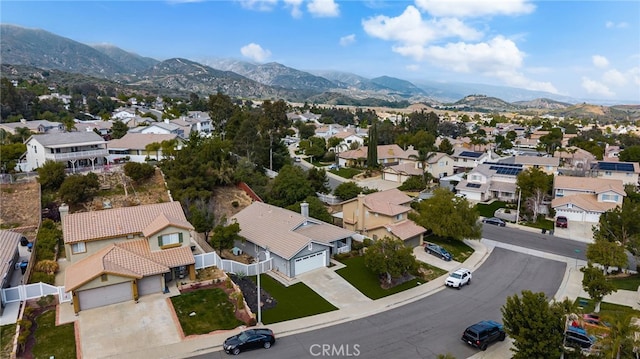 aerial view featuring a residential view and a mountain view