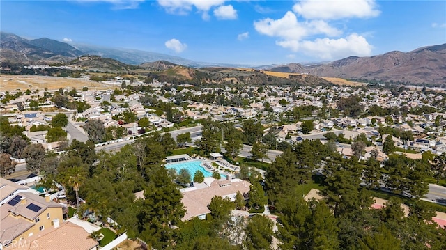 aerial view featuring a mountain view and a residential view