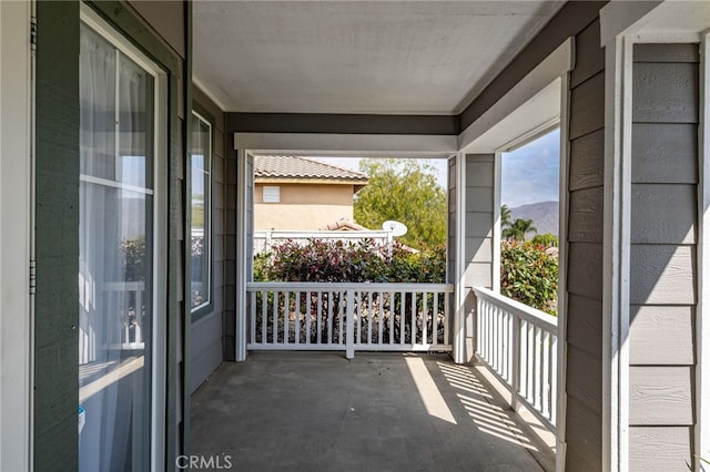balcony featuring a mountain view