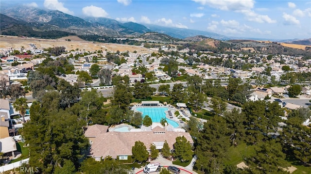 drone / aerial view featuring a mountain view and a residential view
