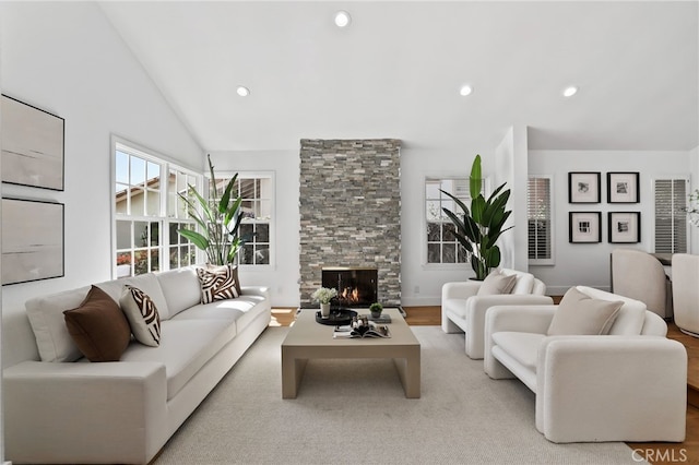 8 Recodo, Irvine, CA 92620 - living area with recessed lighting, a stone fireplace, and vaulted ceiling