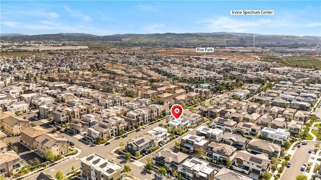 bird's eye view with a residential view and a mountain view