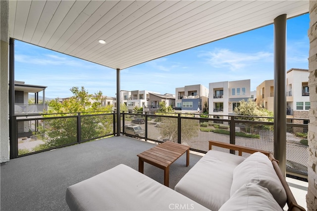 balcony featuring a residential view and outdoor lounge area