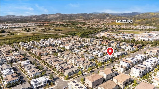 bird's eye view featuring a residential view and a mountain view