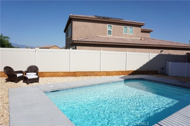 1322 Division Ct, Hemet, CA 92543 - view of swimming pool featuring a fenced backyard