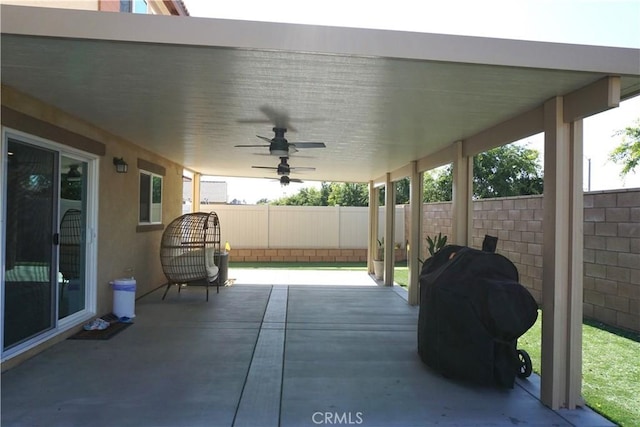 1322 Division Ct, Hemet, CA 92543 - fenced backyard with ceiling fan, grilling area, and a patio area