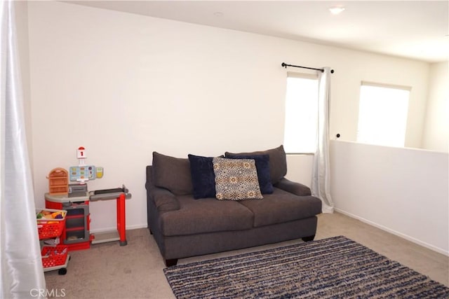 1322 Division Ct, Hemet, CA 92543 - carpeted living area featuring baseboards
