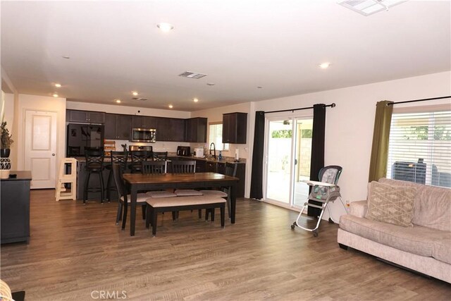 1322 Division Ct, Hemet, CA 92543 - dining area featuring wood finished floors, plenty of natural light, and recessed lighting