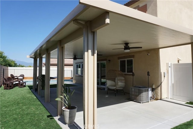 1322 Division Ct, Hemet, CA 92543 - fenced backyard with a ceiling fan and a patio area