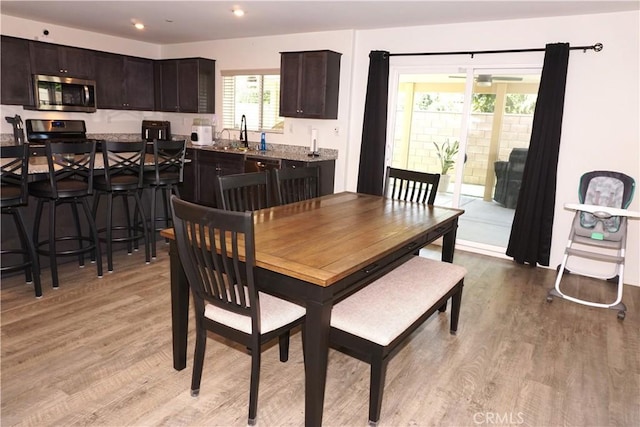 1322 Division Ct, Hemet, CA 92543 - dining space featuring light wood finished floors and recessed lighting