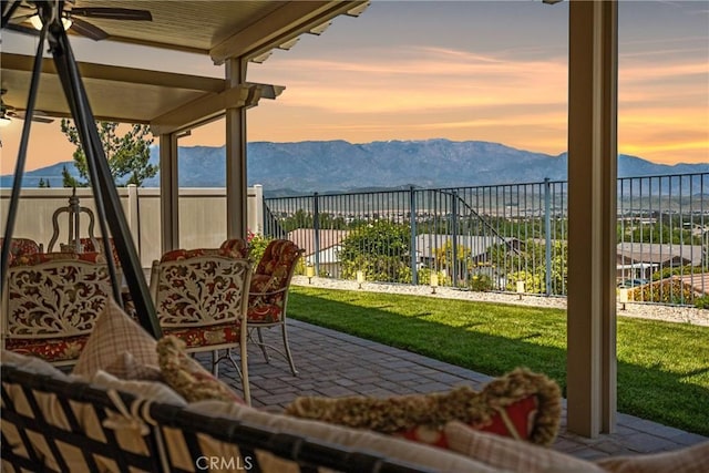 sunroom / solarium with a mountain view