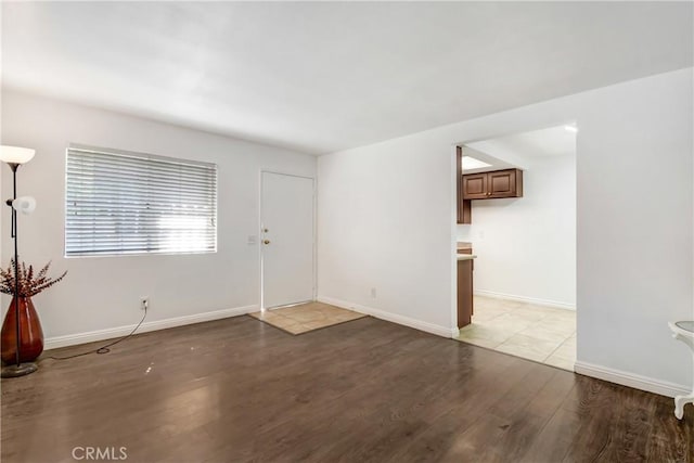542 W Grand Ave, Pomona, CA 91766 - interior space featuring baseboards and light wood-style flooring