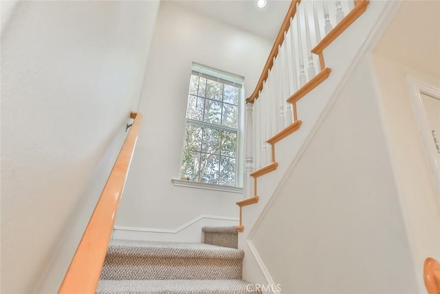 stairway with baseboards