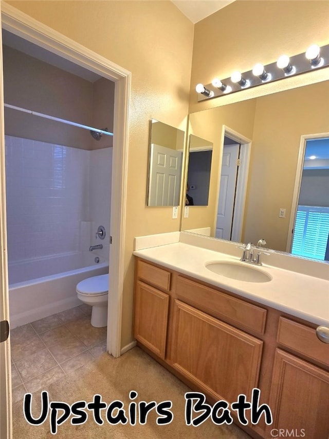 39294 Butler St, Palmdale, CA 93551 - bathroom featuring toilet, vanity, tub / shower combination, and tile patterned floors