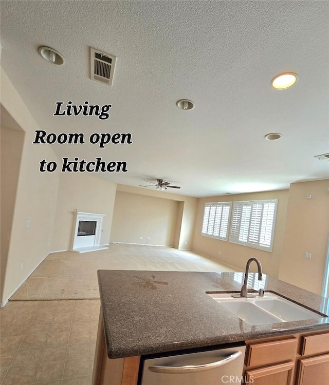 39294 Butler St, Palmdale, CA 93551 - kitchen with a sink, stainless steel dishwasher, a ceiling fan, a center island with sink, and open floor plan