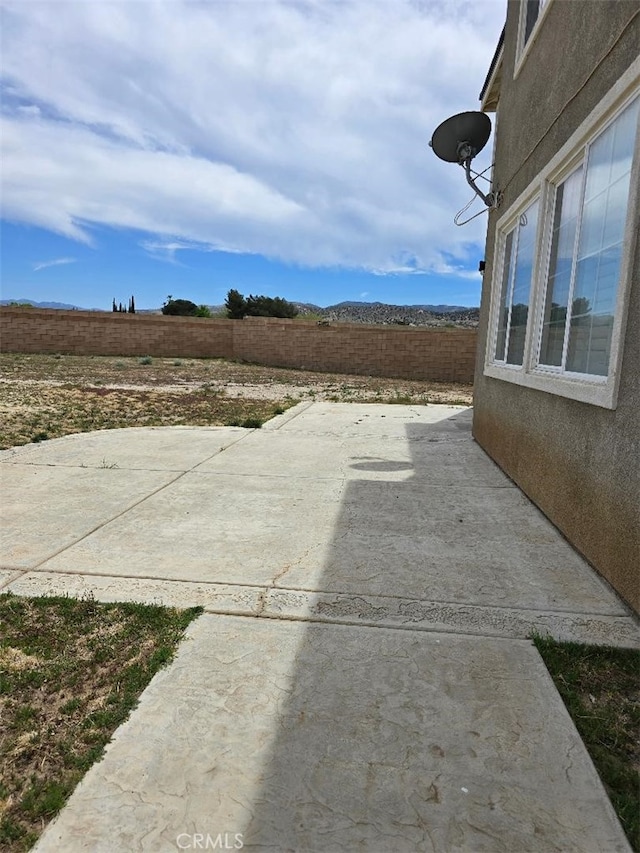 view of patio with a fenced backyard