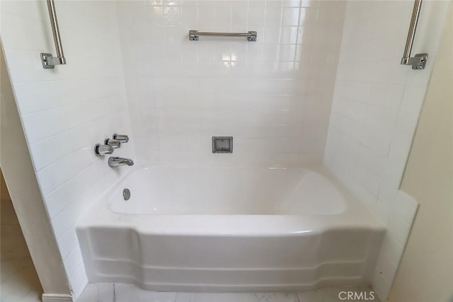 bathroom with walk in shower and a bathtub