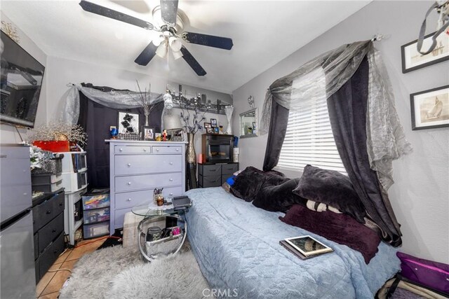 12005 Washington Blvd, Whittier, CA 90606 - bedroom with tile patterned flooring and a ceiling fan