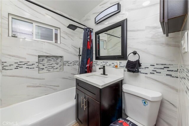 12005 Washington Blvd, Whittier, CA 90606 - bathroom featuring shower / bath combo, tasteful backsplash, vanity, and toilet