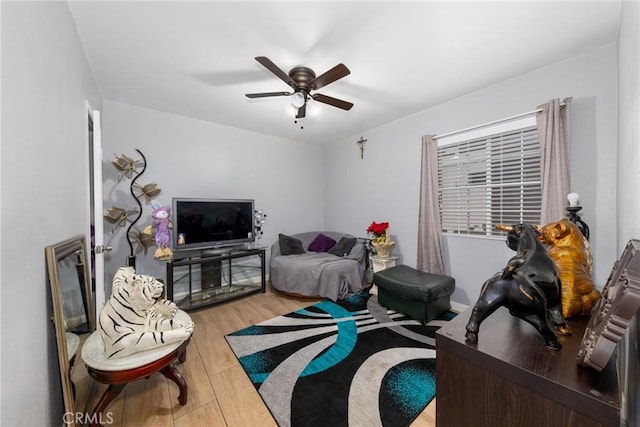 12005 Washington Blvd, Whittier, CA 90606 - living area with light wood-style flooring and a ceiling fan