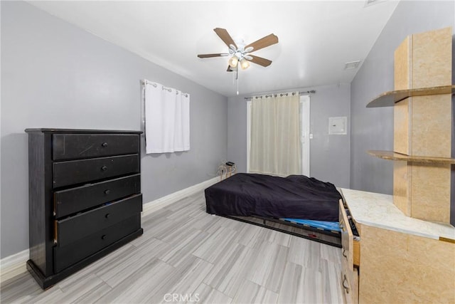 12005 Washington Blvd, Whittier, CA 90606 - bedroom with light wood finished floors, baseboards, and ceiling fan