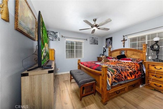 12005 Washington Blvd, Whittier, CA 90606 - bedroom featuring light wood-style floors, baseboards, and a ceiling fan
