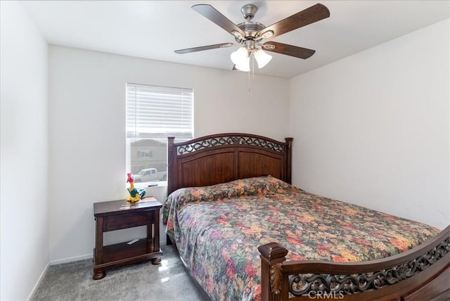 bedroom with a ceiling fan, baseboards, and light carpet