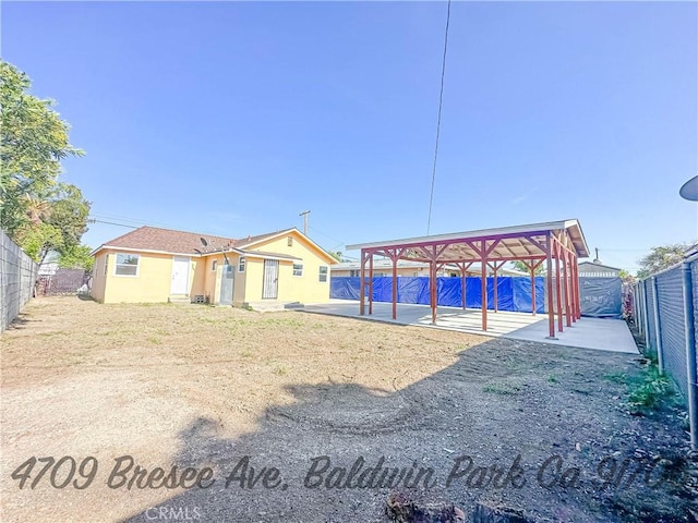 4709 Bresee Ave, Baldwin Park, CA 91706 - view of yard with a fenced backyard and a patio area