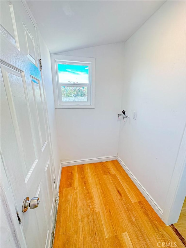 4709 Bresee Ave, Baldwin Park, CA 91706 - hall featuring baseboards, vaulted ceiling, and light wood-type flooring