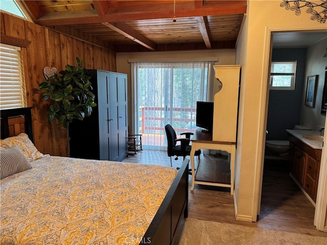 31347 Oakleaf Dr, Running Springs, CA 92382 - bedroom featuring a sink, light wood-style floors, access to exterior, beamed ceiling, and wood ceiling
