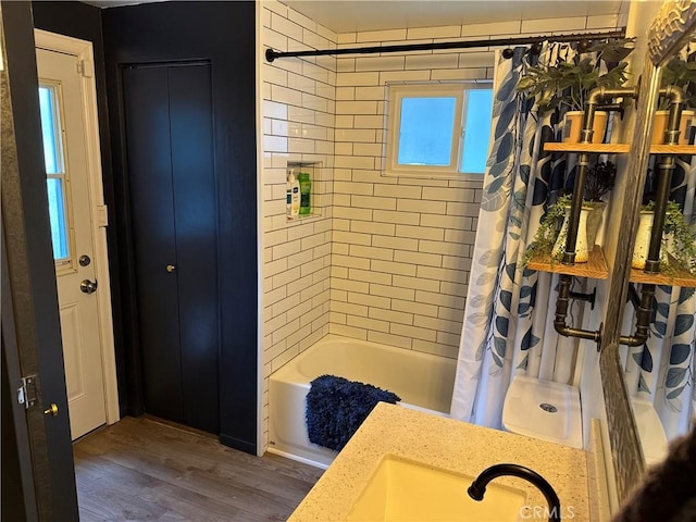 31347 Oakleaf Dr, Running Springs, CA 92382 - bathroom featuring a sink, wood finished floors, and shower / tub combo