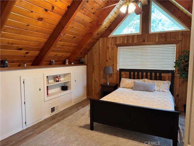 31347 Oakleaf Dr, Running Springs, CA 92382 - bedroom with visible vents, wood finished floors, wooden ceiling, wooden walls, and vaulted ceiling with beams
