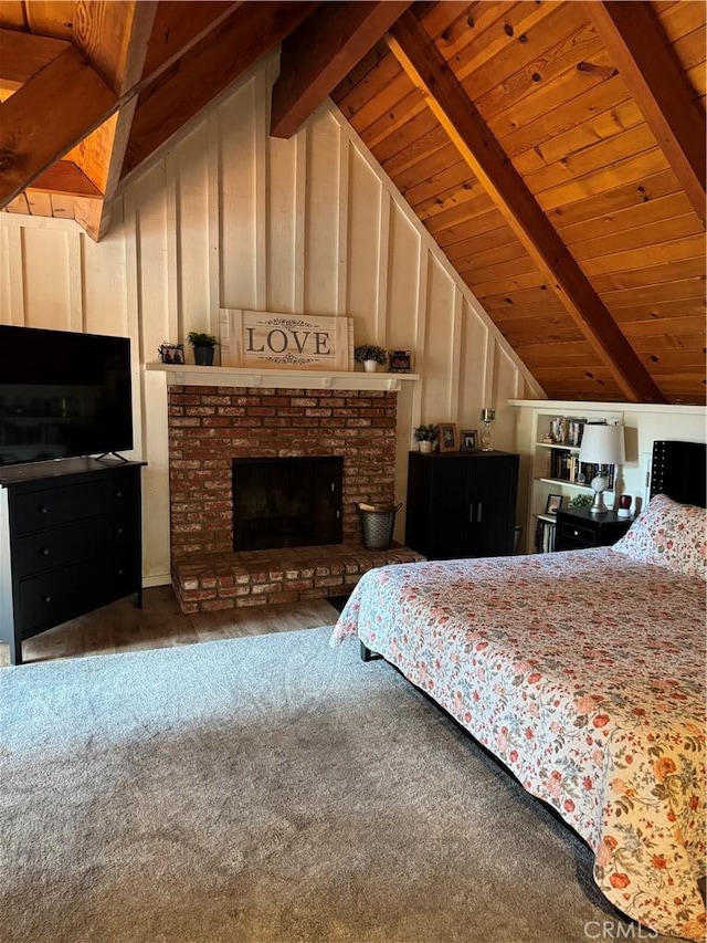 31347 Oakleaf Dr, Running Springs, CA 92382 - bedroom with carpet, wooden ceiling, lofted ceiling with beams, and a fireplace