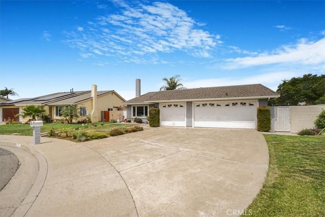 4433 E Justice Cir, Orange, CA 92869 - single story home featuring a gate, a garage, a front lawn, and driveway