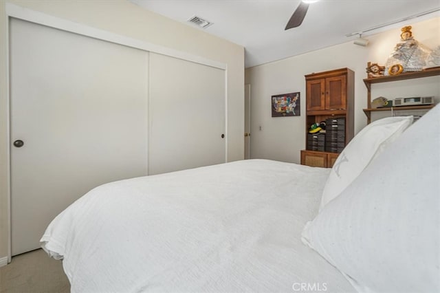4433 E Justice Cir, Orange, CA 92869 - carpeted bedroom featuring a closet, a ceiling fan, and visible vents