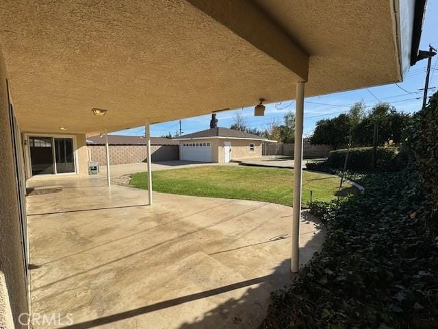 view of patio / terrace with fence