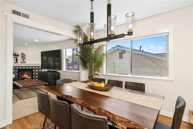 1614 Amelia Ave, San Pedro, CA 90731 - dining space featuring plenty of natural light, wood finished floors, and baseboards